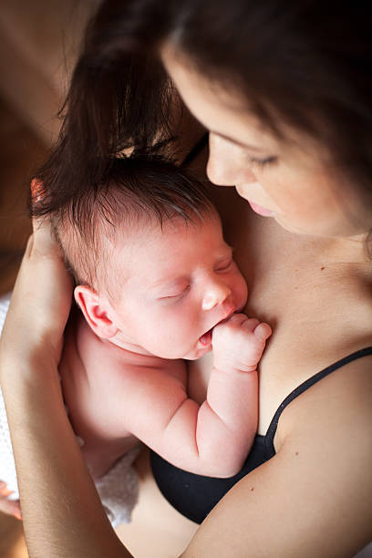 istock Young mother and her sleeping baby 512201544