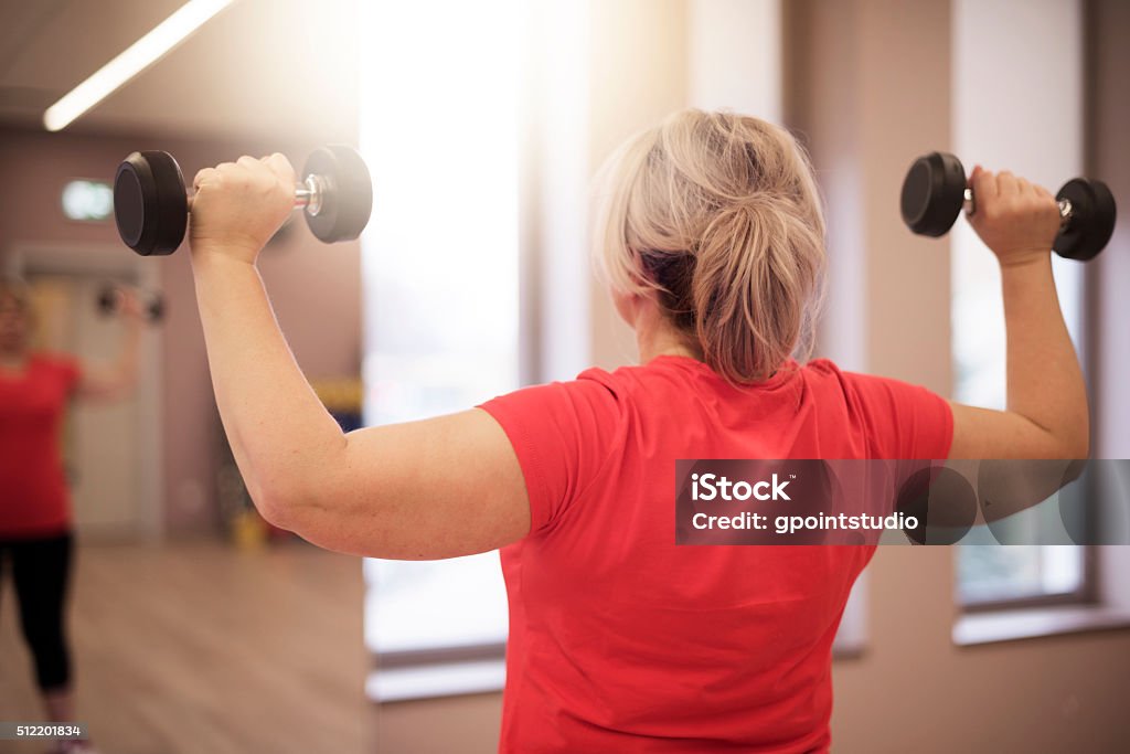 Working on shoulders in this age is important for women Women Stock Photo