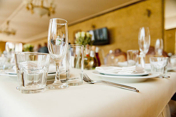 istock Wedding glasses filled with champagne at banquet 512203320