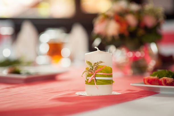 Image of holy family and candle on wedding table luxury
