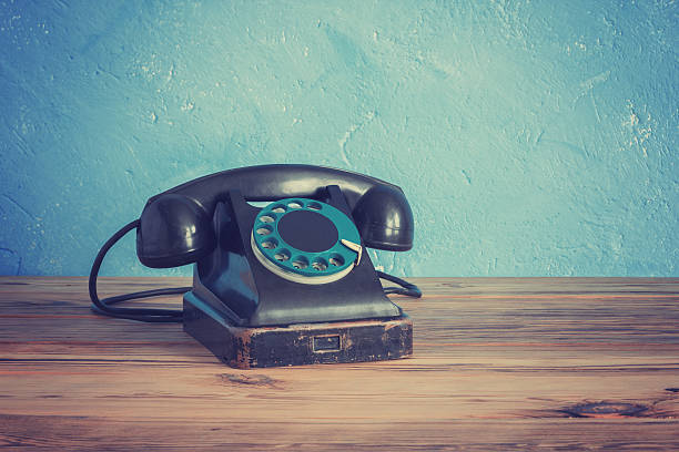 Vintage phone on a wooden table