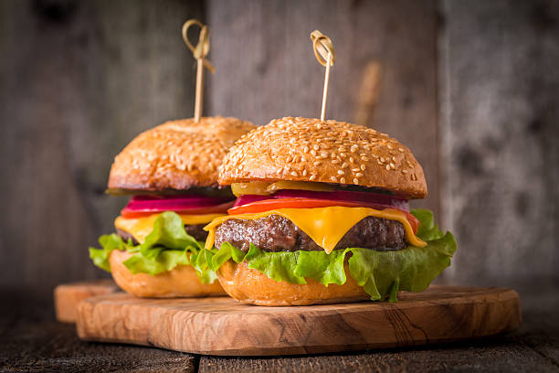 istock Closeup of home made burgers 512205796