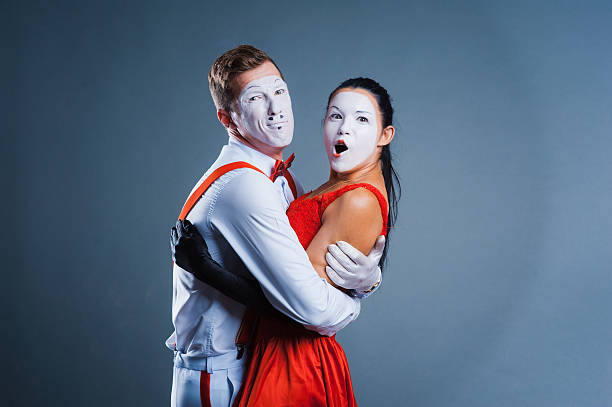 istock two funny mimes isolated on gray background 512208446