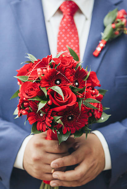 istock wedding bouquet in hands of the bride 512209996