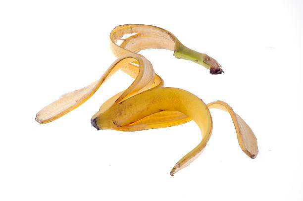 istock Banana peel thrown to the ground 512210948