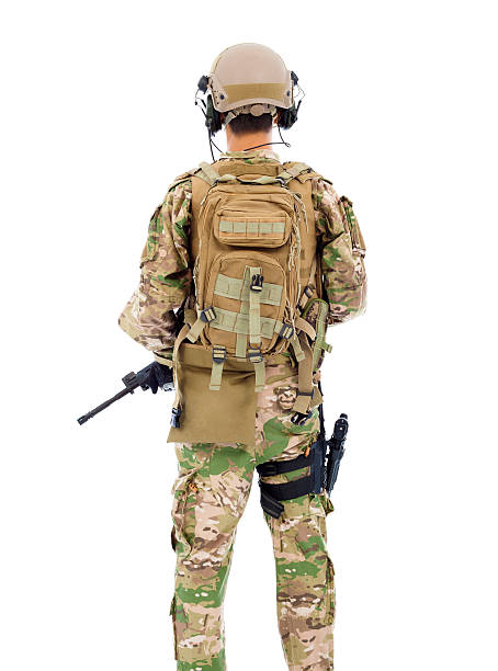 istock back view of soldier with rifle or sniper in studio 512211233