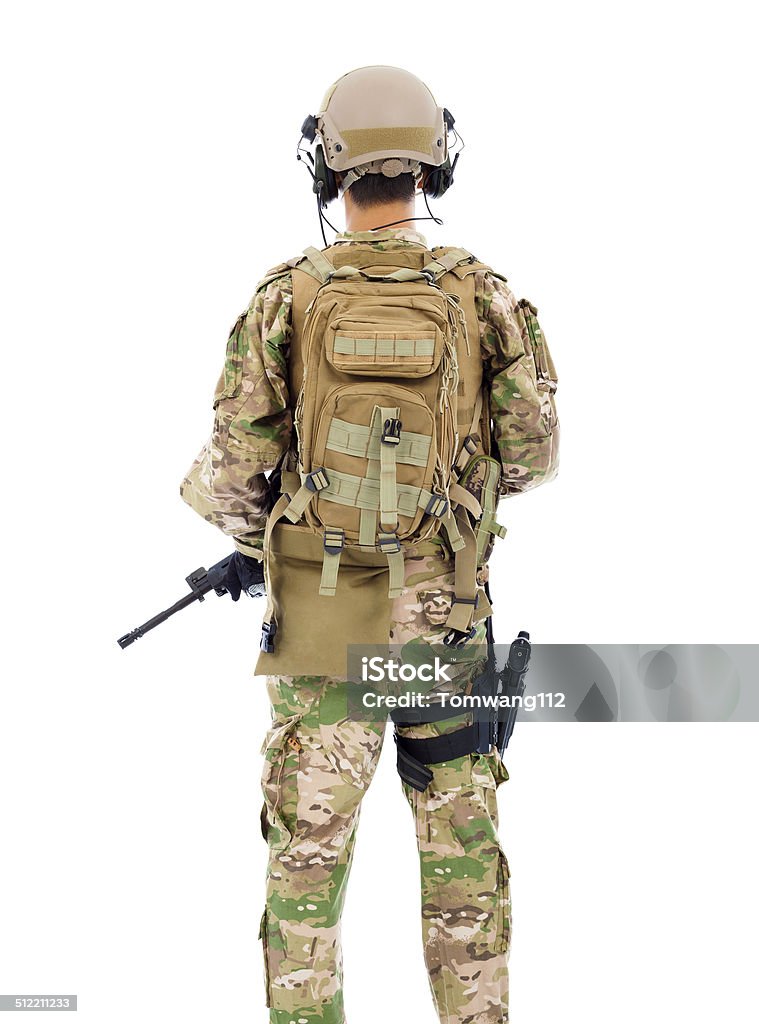 back view of soldier with rifle or sniper in studio back view of soldier with rifle or sniper over white background Rear View Stock Photo