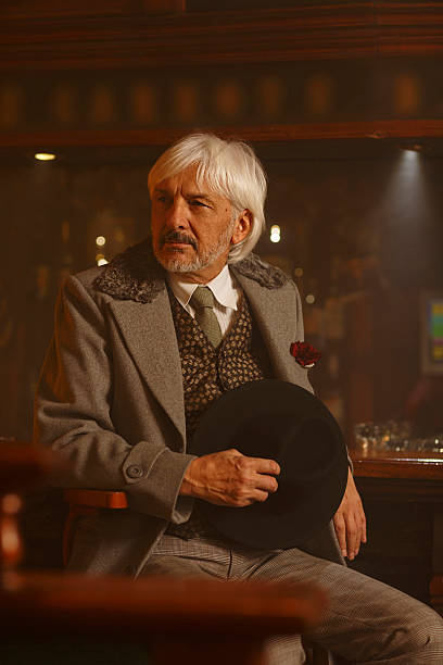 istock Retro romantic Old fashioned senior man in old pub 512211518