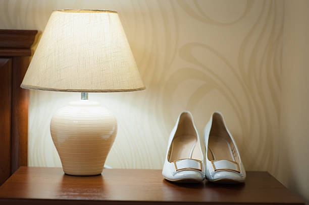 istock beautiful white shoes from bride with a lamp 512212948