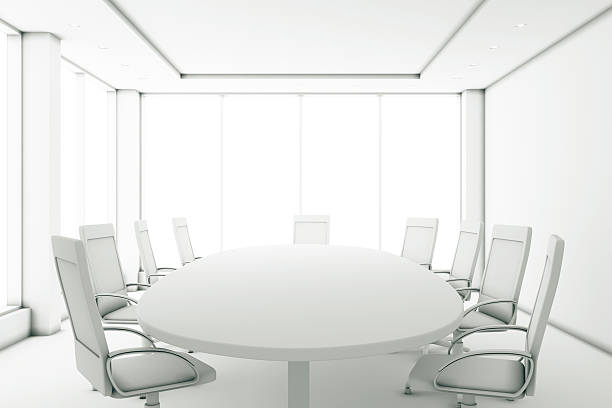 completamente bianco sala sale riunioni con un tavolo rotondo - boardroom chairs foto e immagini stock