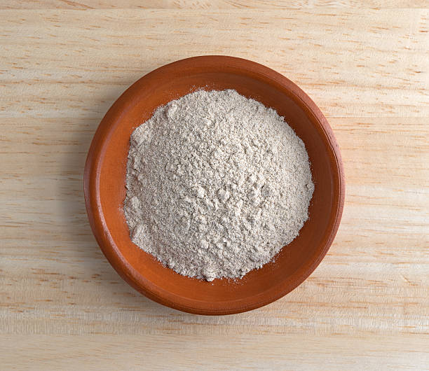 istock Brown gravy dry mix in bowl on counter top 512214682