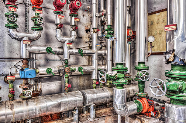 Abandoned industrial boiler room stock photo