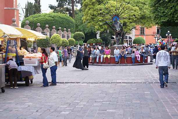Plaza in Santiago de Queretaro with crowd of people, Mexico stock photo