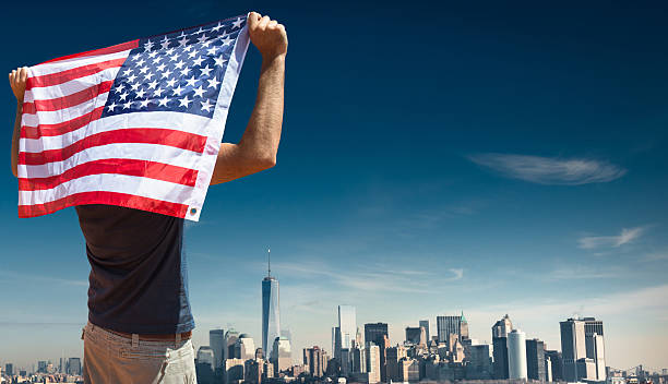 istock Tourist with flag in manhattan 512221632