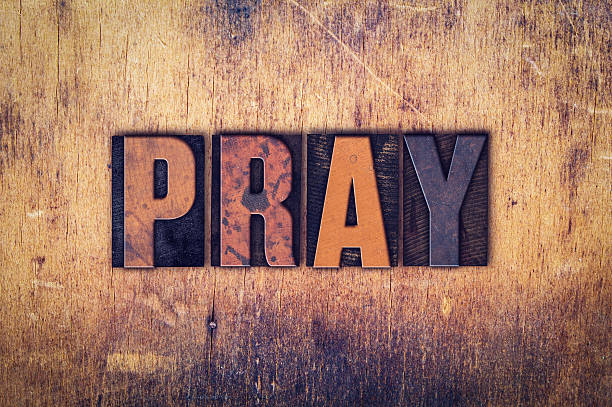 istock Pray Concept Wooden Letterpress Type 512222616