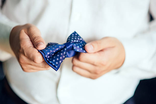 istock Man the groom in a wedding formal costume 512223170