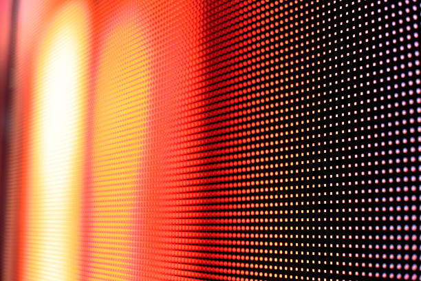 Warm colored LED smd wall Warm colored LED smd wall - close up background coming out of computer screen stock pictures, royalty-free photos & images