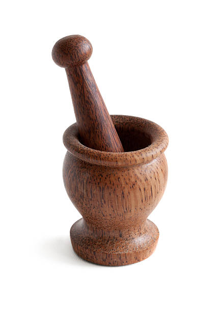 istock wooden mortar with pestle 512225982