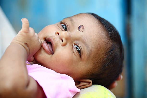 Cute Indian little baby in outdoor.