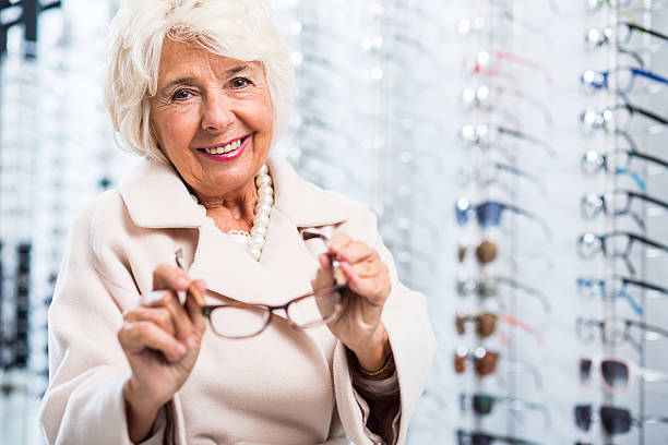 Female retiree in optician store