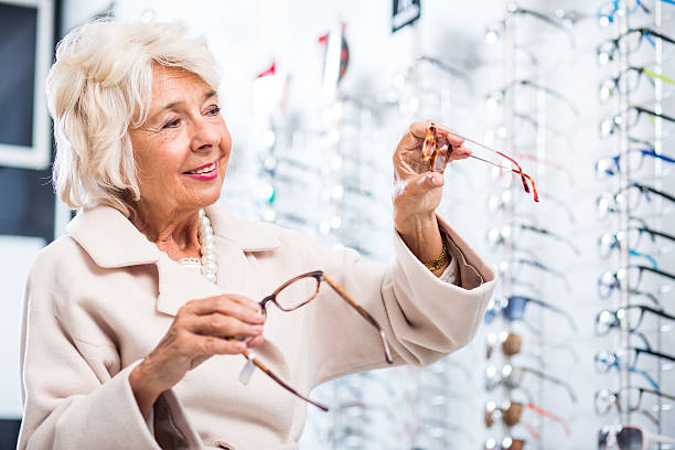 istock Female customer in optician store 512228692