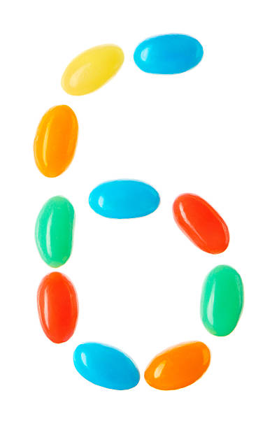 istock 6 number made of multicolored candies isolated on white 512229112