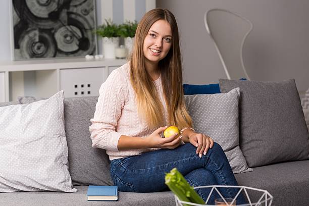 istock Fit girl eating an apple 512230392