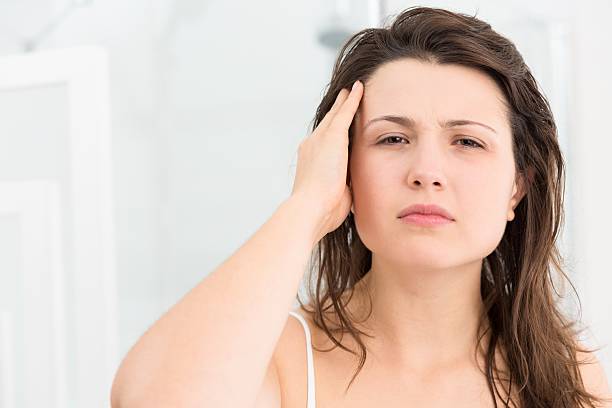istock Woman looking at the mirror 512231120