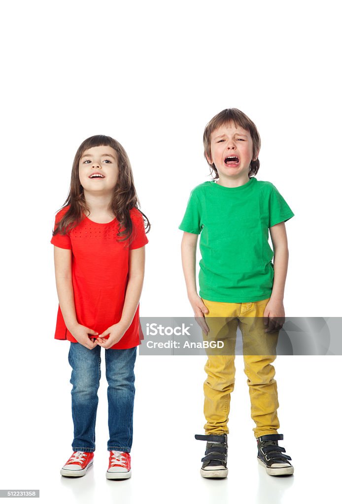 Smiling and crying Image of smiling girl and crying boy, isolated on white Child Stock Photo