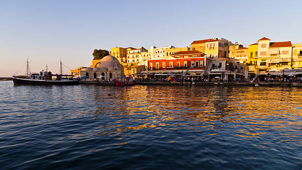 istock Panoramic view of Chania harbor promenade at sunset, Crete 512247431