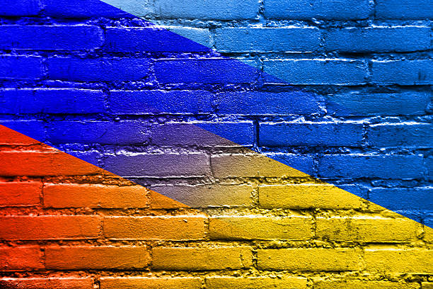 istock Ukraine and Russia Flag painted on brick wall 512248469