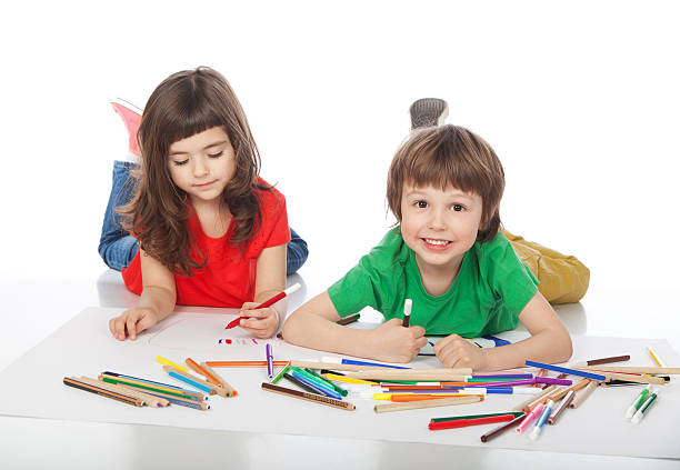 istock Boy and girl doodling 512272570