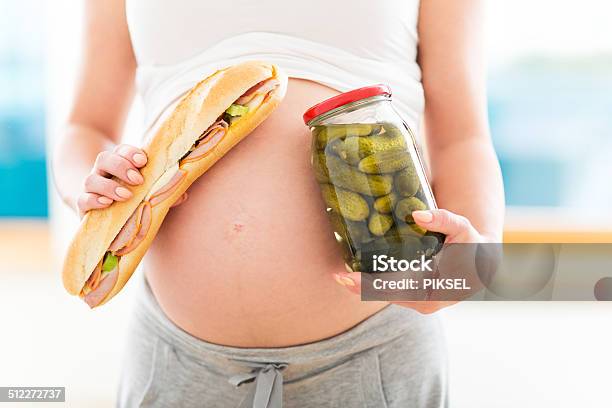 Pregnant Woman With Sandwich And Jar Of Pickles Stock Photo - Download Image Now - Holding, Only Women, Sandwich