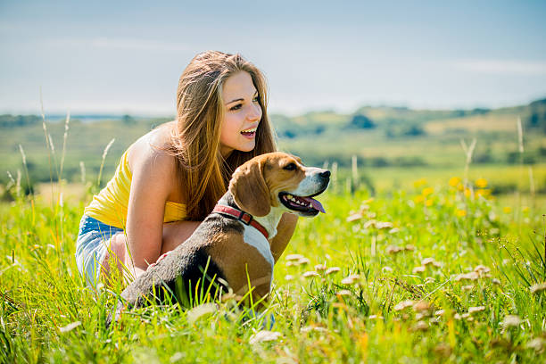 istock Teenager with her dog 512273489