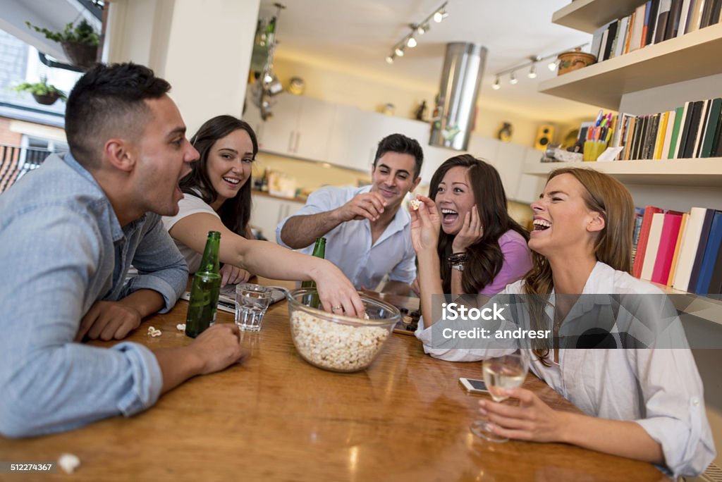 Friends having fun at home Group of friends having fun at home 20-29 Years Stock Photo