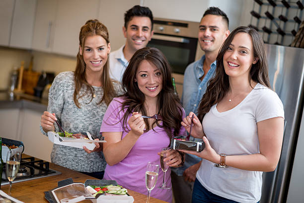 istock Group of friends at a party 512274425