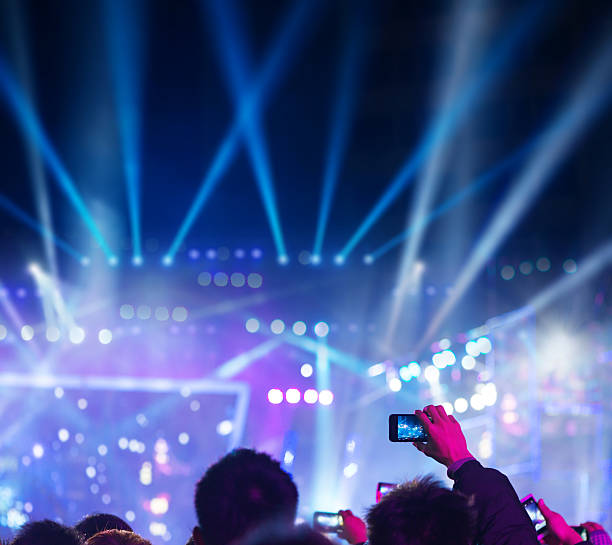 istock audience silhouettes at a live music concert 512275977