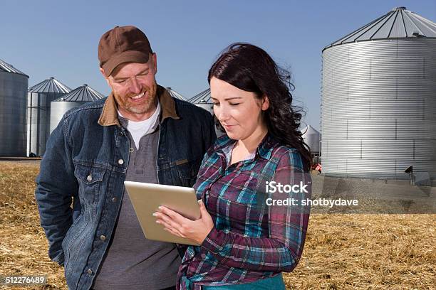 Farmer Couple And Technology Stock Photo - Download Image Now - Farmer, Farm, Digital Tablet