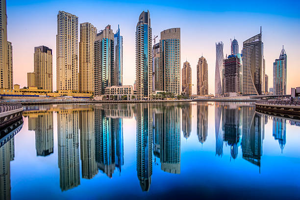 istock Dubai Skiline reflections at sunset, Dubai. 512277848