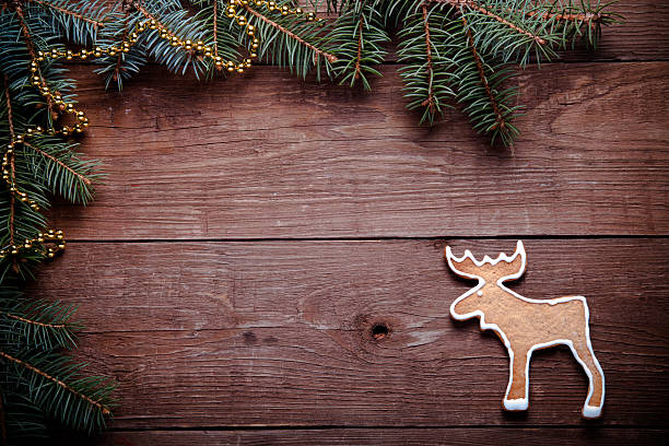 istock Gingerbread homemade cookies with icing and christmas tree branc 512278384