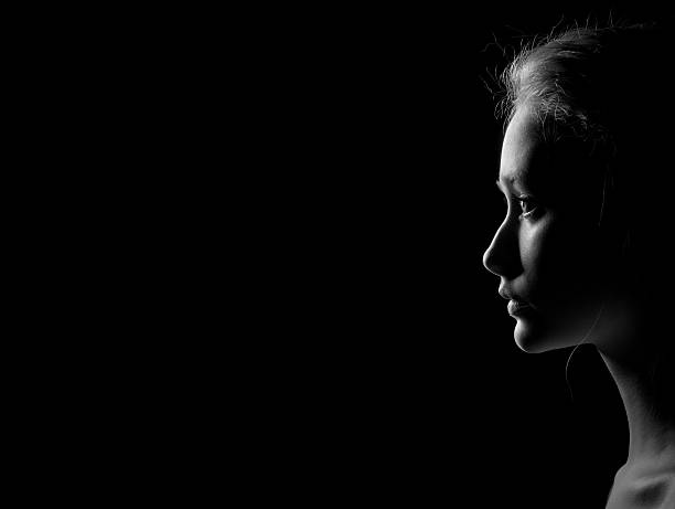 istock profile of sad woman 512279574