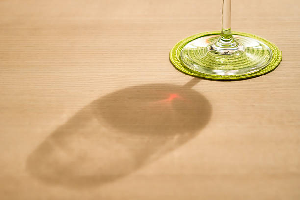 istock shadow of a glass with red wine 512279866