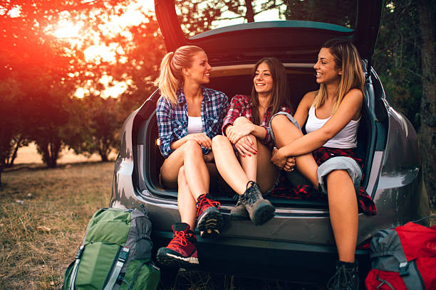 istock Young Women Preparing For Hike and Camping In Forest. 512280644