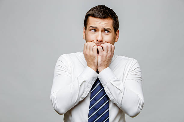 istock Handsome stylish businessman on grey background 512280826