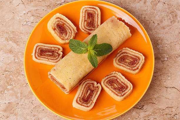 istock Bolo de rolo (swiss roll, roll cake) Brazilian dessert 512281154