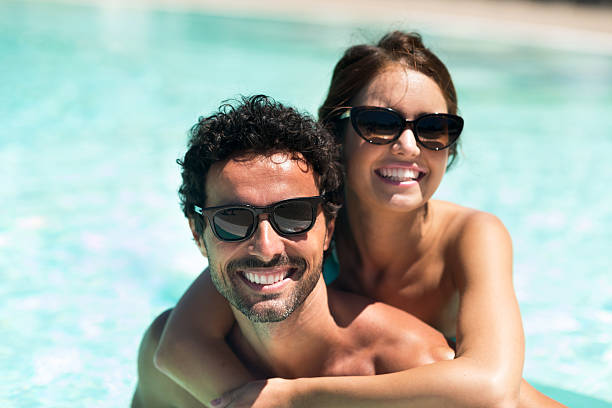istock Couple having fun in the water 512281642