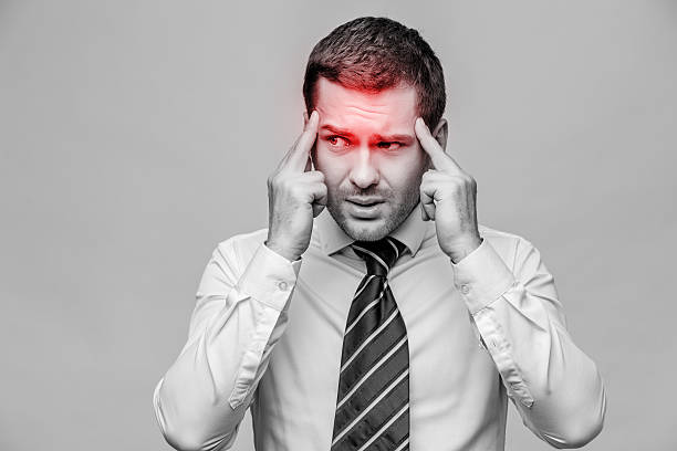 istock Handsome stylish businessman on grey background 512281774