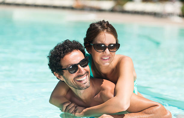 istock Couple having fun in the water 512281788