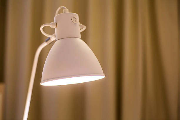 istock light of desk lamp at night 512283042