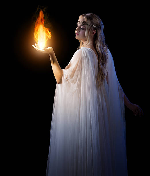 istock Young elven girl holding fire in palms 512286796